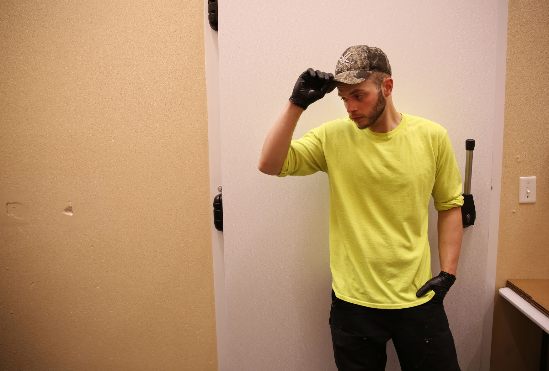 James Miller rests against the door as everyone else clocks out